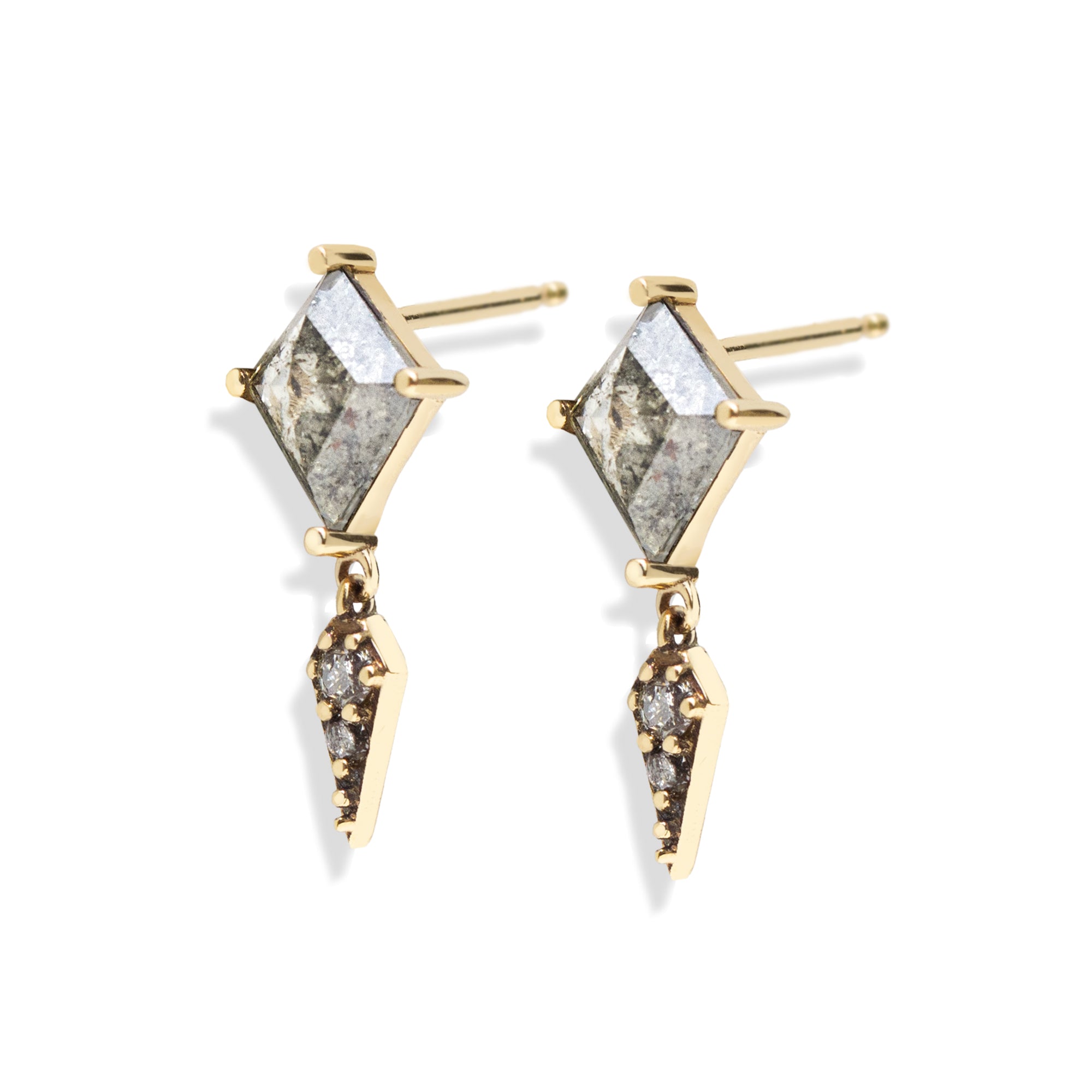 A striking blend of edge and elegance, these earrings feature 1.1 total carats of kite-cut salt and pepper diamonds set in an antique-finished setting. The modern silhouette is elevated by sleek kite-shaped charms, making them the perfect statement earrings for both everyday wear and evenings out. This item is one of a kind. 