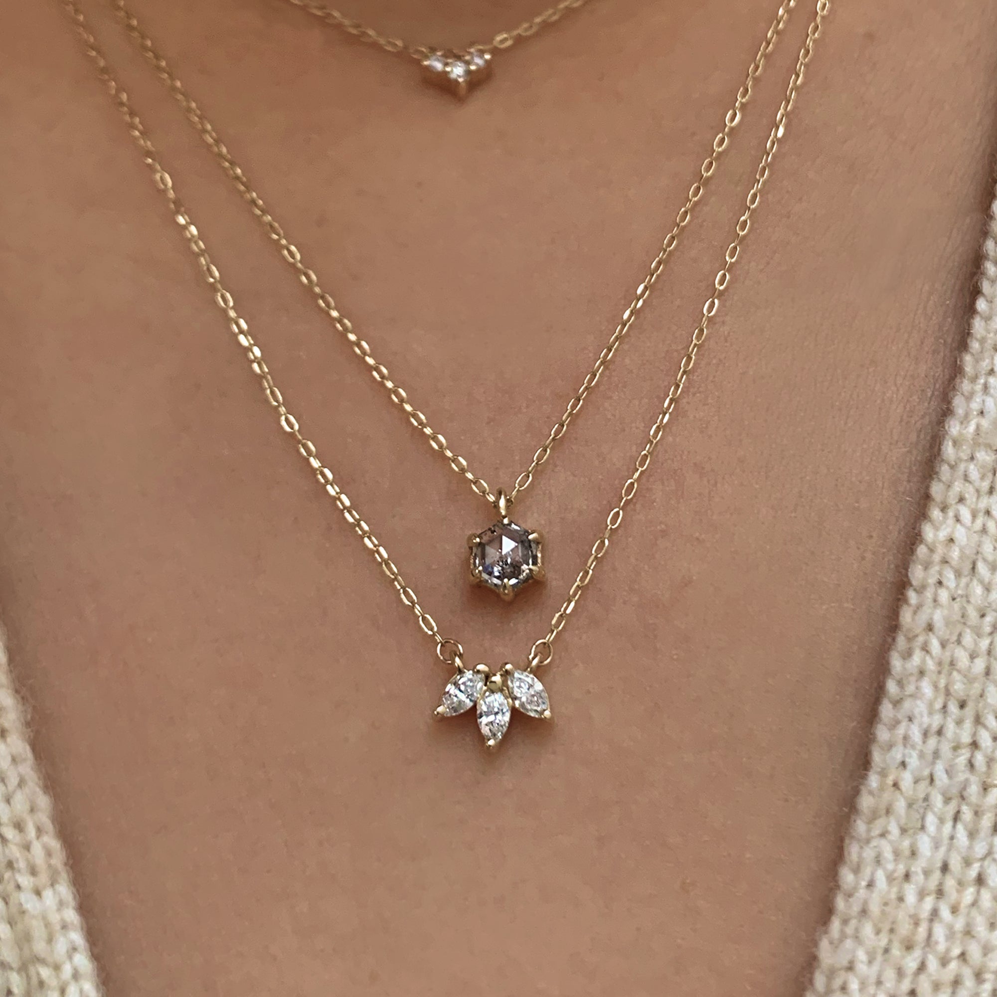 Jamie Park Jewelry - 0.47ct. Salt and Pepper Diamond Necklace https://jamieparkjewelry.com/products/0-47ct-salt-and-pepper-diamond-necklace This remarkable necklace holds a 0.47ct. Salt and Pepper Diamond, exhibiting a luxurious matrix and clarity that brings out its natural beauty. Its unique cut makes the diamond appear larger than its stated size, radiating a dazzling shimmer that is sure to turn heads.