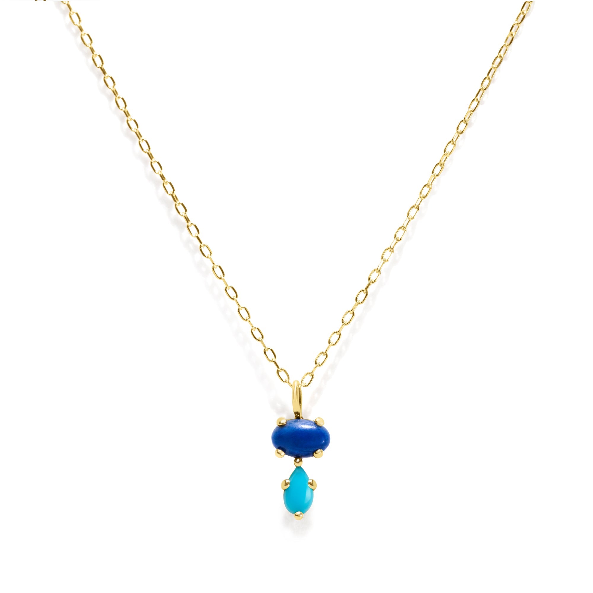 Add a vibrant touch of color with our Bubble Drop Necklace, featuring an oval lapis lazuli and a pear-cut turquoise, set in solid 14K gold. Inspired by the beauty of a cool summer night by the beach, this delicate blue gemstone necklace evokes the deep blue sky above the clear ocean. Perfect for everyday wear or as a thoughtful gift.
