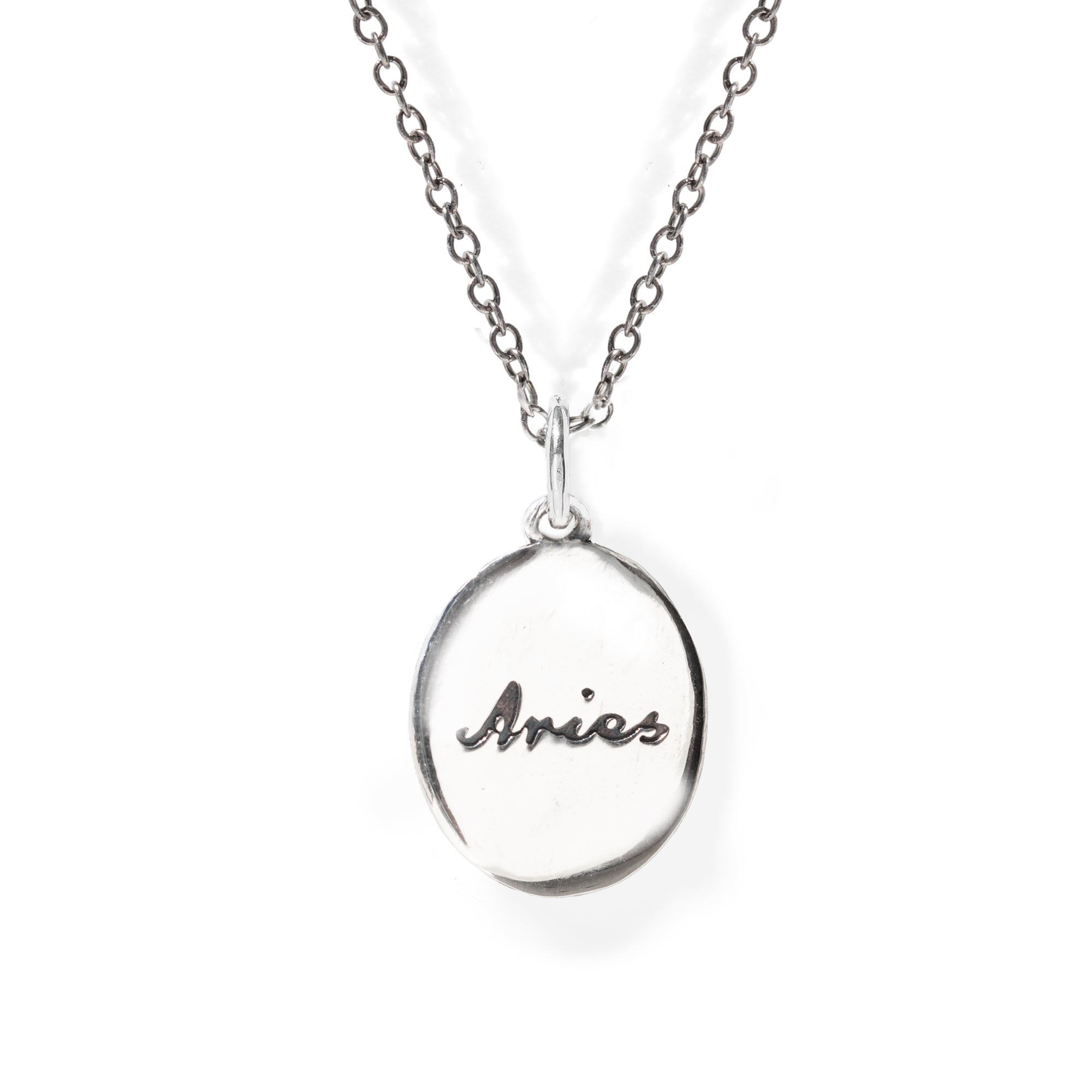 Silver necklace with 'Aries' pendant on a white background