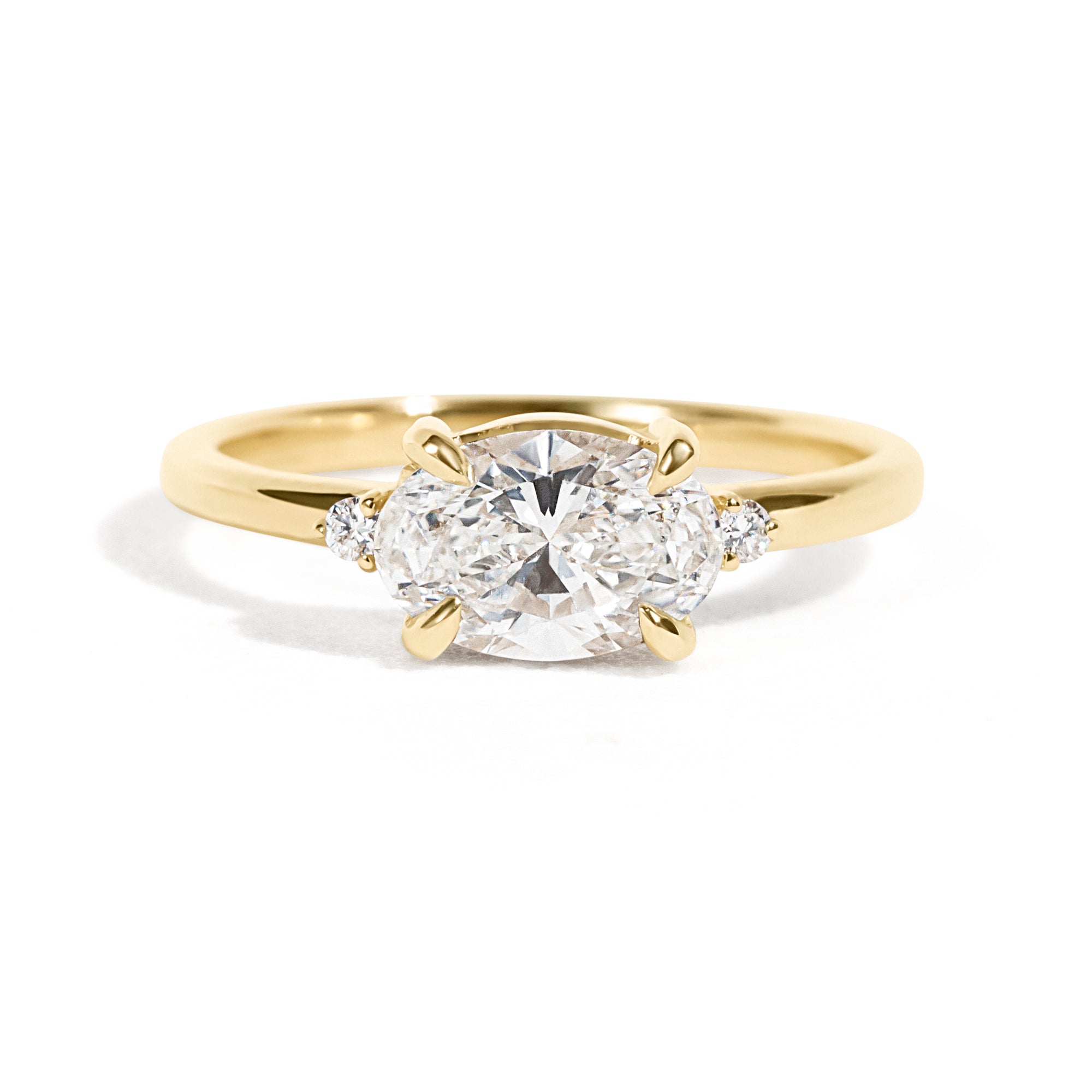 Ella 1ct East-West Oval Ring-The best-selling Ella Ring has an east-west oval setting that features an oval center diamond or moissanite. Crafted with a timeless and modern style, this ring makes for the perfect engagement ring or anniversary gift. More carat and color/clarity options are available. Contact us for more information.