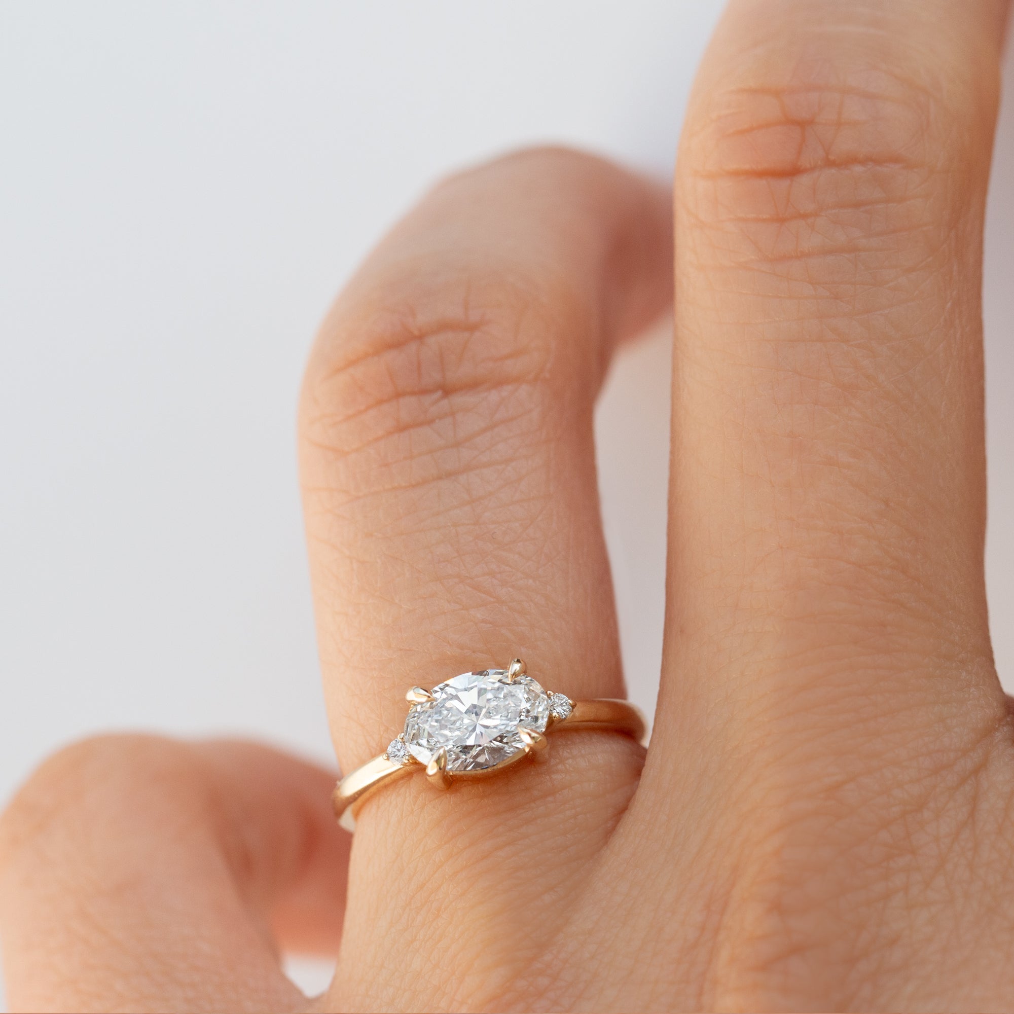 Ella 1ct East-West Oval Ring-The best-selling Ella Ring has an east-west oval setting that features an oval center diamond or moissanite. Crafted with a timeless and modern style, this ring makes for the perfect engagement ring or anniversary gift. More carat and color/clarity options are available. Contact us for more information.