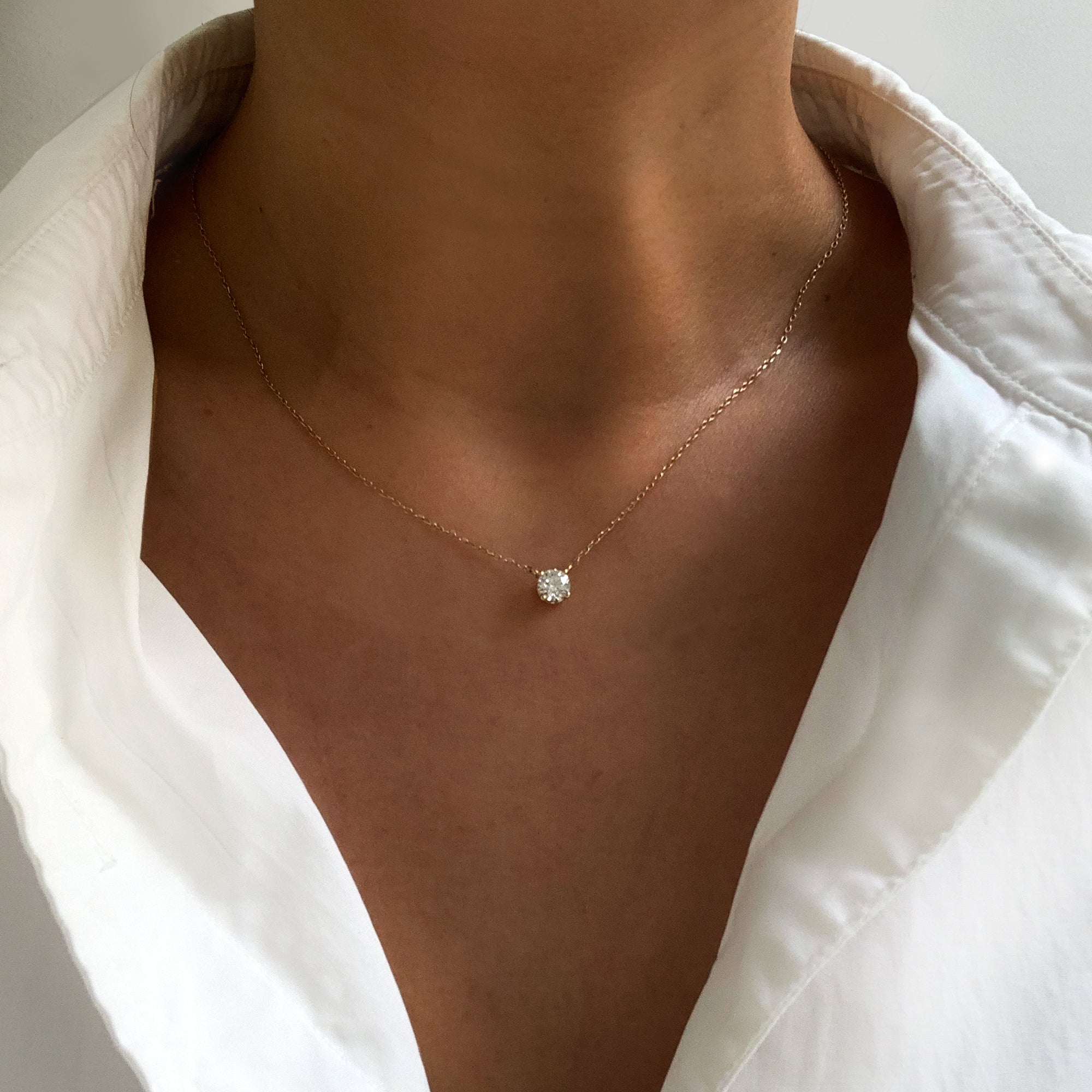 Jamie Park Jewelry - Round Diamond Solitaire Necklace This Round Diamond Solitaire Necklace features a sparkling lab diamond, set in a classic four prong design. With each diamond certified by IGI, this necklace makes for a timeless and cherished gift, perfect for any special occasion. Add a touch of elegance to any outfit with this beautiful piece. Chain length 16-18" 