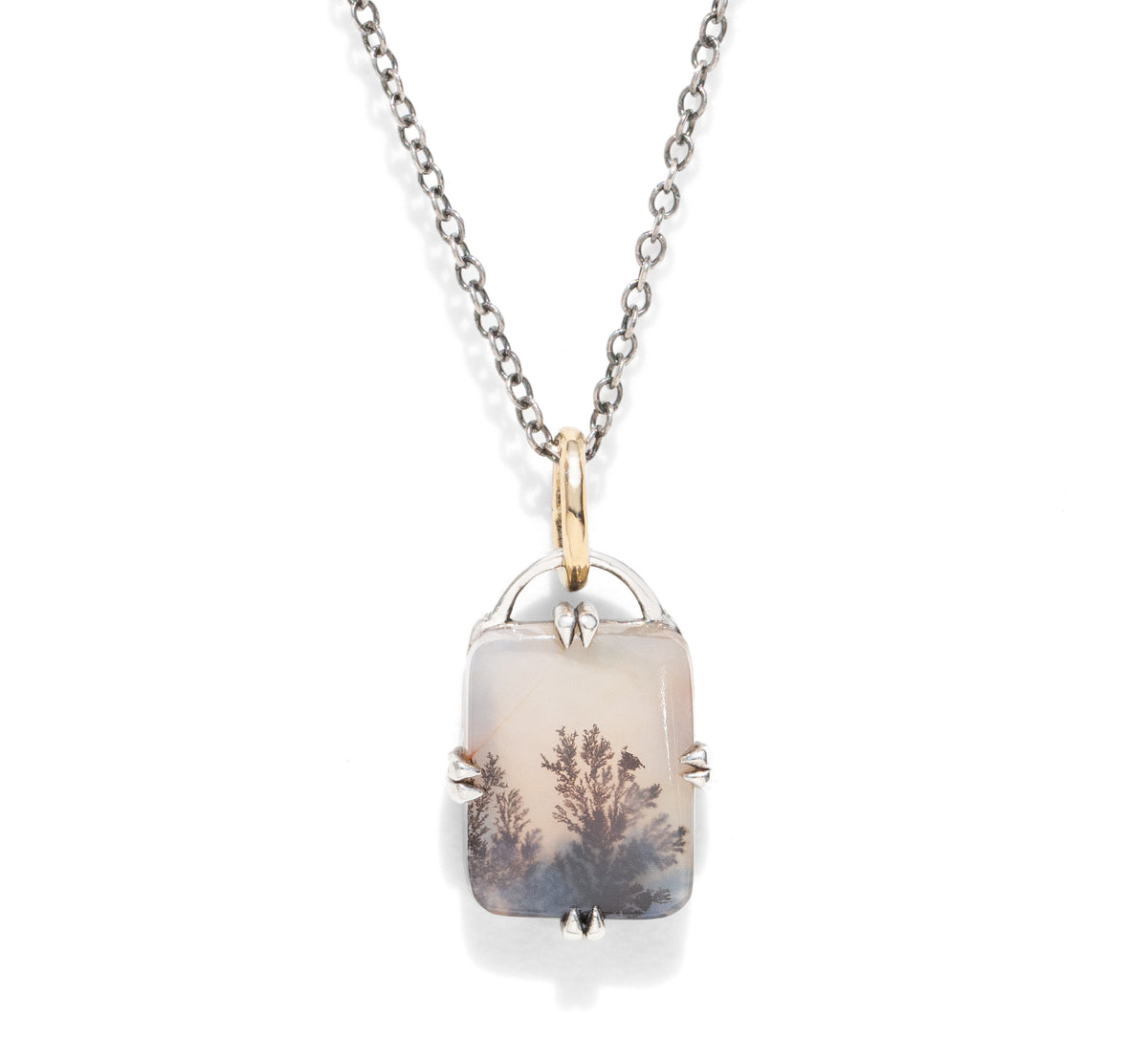 A rectangular gemstone pendant necklace against a white background.