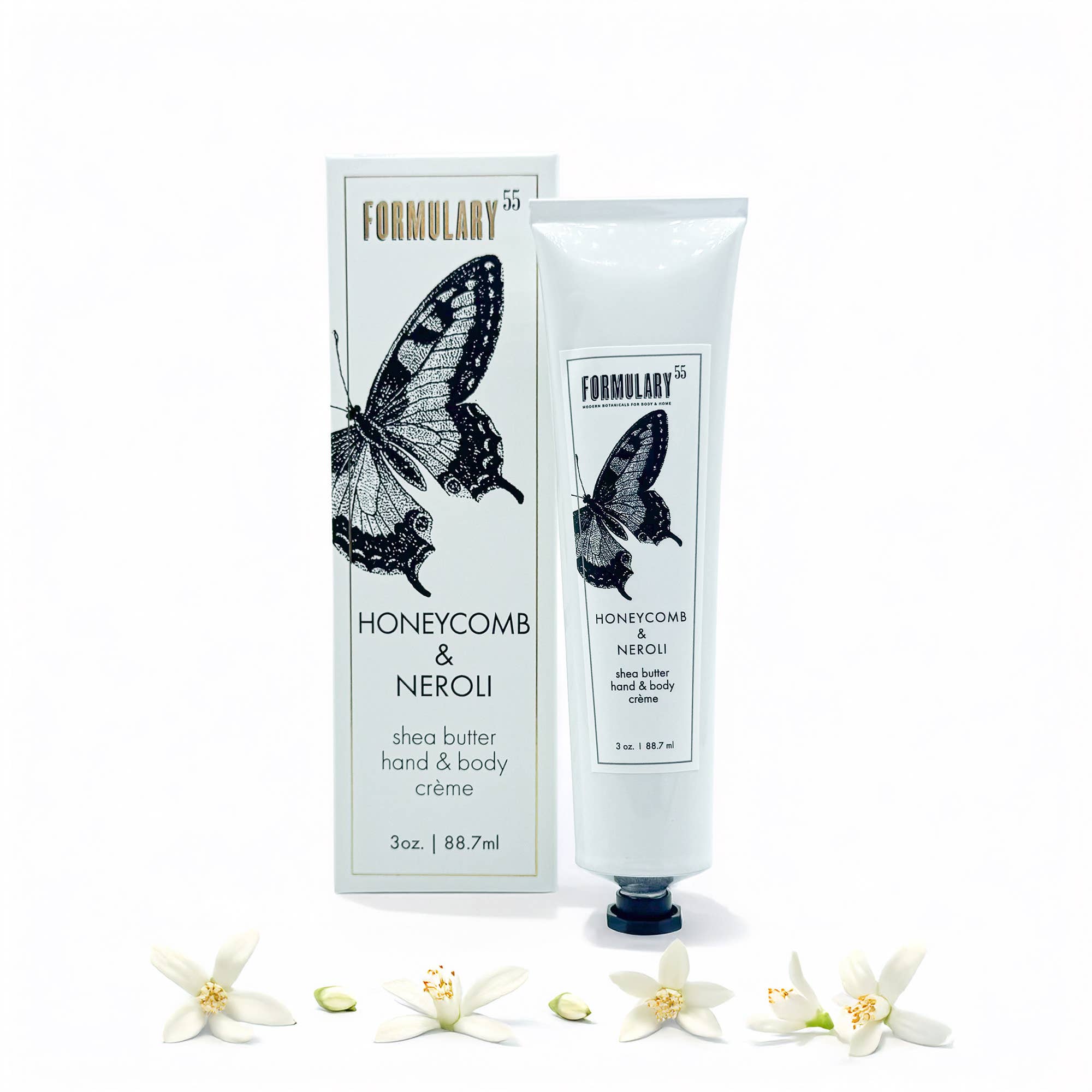 Shea butter hand and body crème with packaging featuring a butterfly design on a white background.