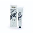 Shea butter hand and body crème with packaging labeled 'Vintage Peony' on a white background