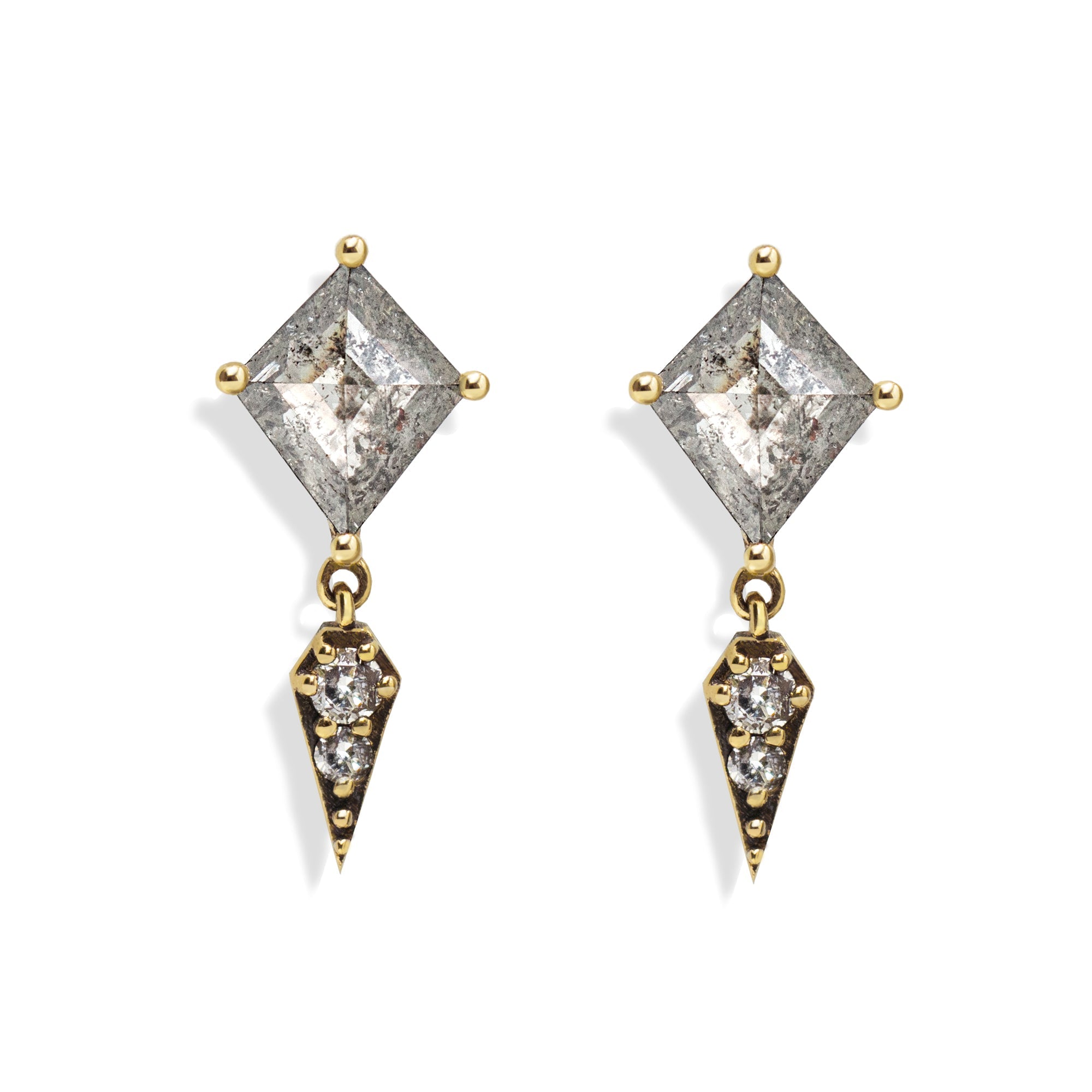 A striking blend of edge and elegance, these earrings feature 1.1 total carats of kite-cut salt and pepper diamonds set in an antique-finished setting. The modern silhouette is elevated by sleek kite-shaped charms, making them the perfect statement earrings for both everyday wear and evenings out. This item is one of a kind.&nbsp;