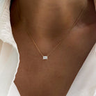 Jamie Park Jewelry Emerald Cut Diamond Solitaire Necklace This Emerald Diamond Solitaire Necklace features a sparkling lab diamond, set in a classic four prong design. With each diamond certified by IGI, this necklace makes for a timeless and cherished gift, perfect for any special occasion. Add a touch of elegance to any outfit with this beautiful piece. Chain length 16-18"&nbsp;