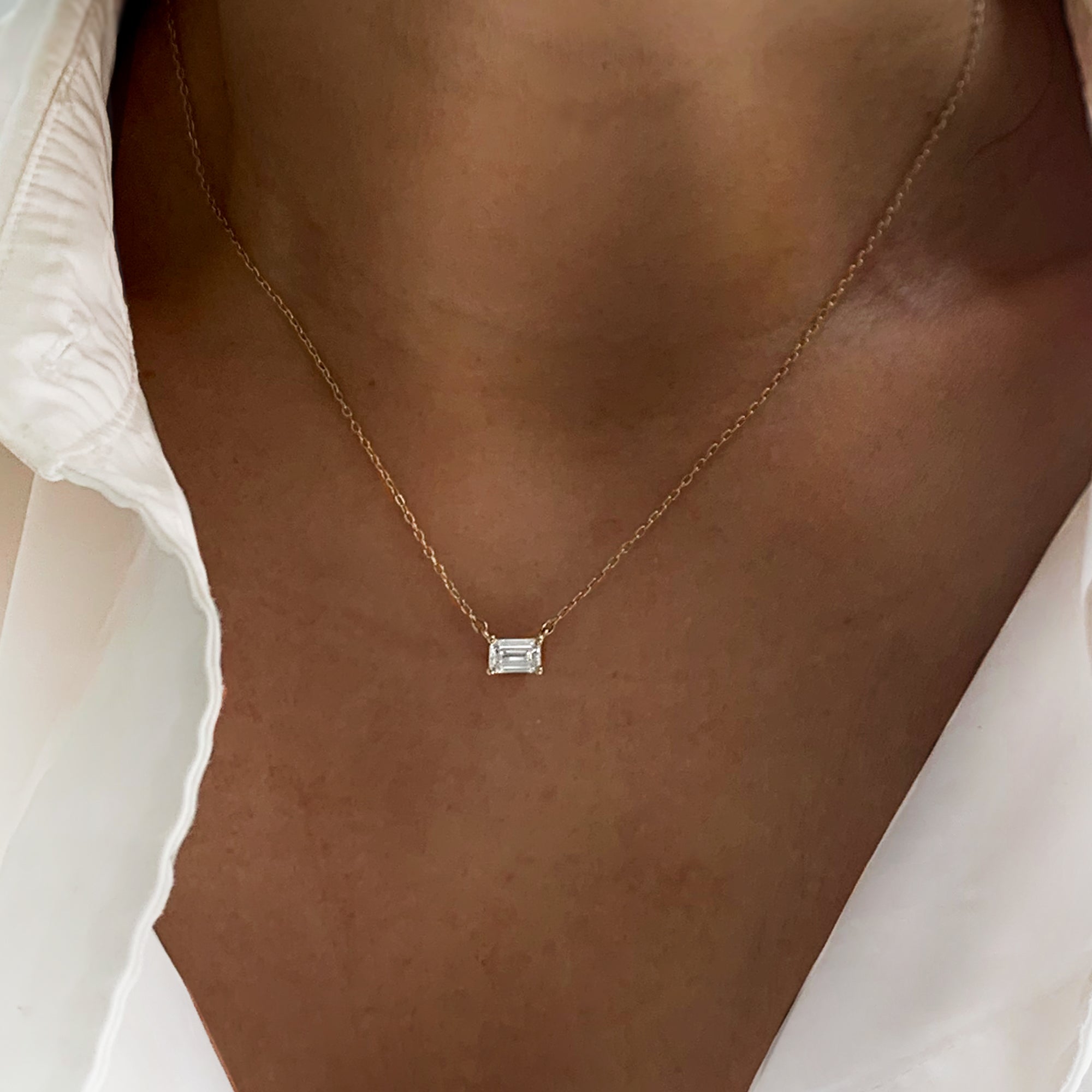 Jamie Park Jewelry Emerald Cut Diamond Solitaire Necklace This Emerald Diamond Solitaire Necklace features a sparkling lab diamond, set in a classic four prong design. With each diamond certified by IGI, this necklace makes for a timeless and cherished gift, perfect for any special occasion. Add a touch of elegance to any outfit with this beautiful piece. Chain length 16-18"&nbsp;