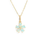 A floral shaped , five gemstone pendant necklace in gold color against a white background. 