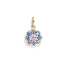 A gemstone pendant against a white background