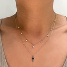 Add a vibrant touch of color with our Bubble Drop Necklace, featuring an oval lapis lazuli and a pear-cut turquoise, set in solid 14K gold. Inspired by the beauty of a cool summer night by the beach, this delicate blue gemstone necklace evokes the deep blue sky above the clear ocean. Perfect for everyday wear or as a thoughtful gift.
