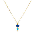 Add a vibrant touch of color with our Bubble Drop Necklace, featuring an oval lapis lazuli and a pear-cut turquoise, set in solid 14K gold. Inspired by the beauty of a cool summer night by the beach, this delicate blue gemstone necklace evokes the deep blue sky above the clear ocean. Perfect for everyday wear or as a thoughtful gift.
