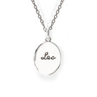 Silver necklace with a round pendant engraved with 'leo' on a white background