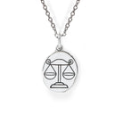Silver necklace with a Libra zodiac sign pendant on a white background