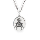 Silver necklace with a scorpion pendant on a white background