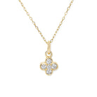 Gold necklace with a diamond-four leaf clover pendant on a white background