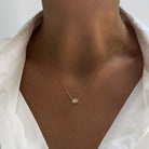 Jamie Park Oval Diamond Solitaire Necklace This Oval Diamond Solitaire Necklace features a sparkling lab diamond, set in a classic four prong design. With each diamond certified by IGI, this necklace makes for a timeless and cherished gift, perfect for any special occasion. Add a touch of elegance to any outfit with this beautiful piece. Chain length 16-18"&nbsp;
