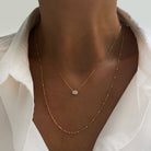 Jamie Park Oval Diamond Solitaire Necklace This Oval Diamond Solitaire Necklace features a sparkling lab diamond, set in a classic four prong design. With each diamond certified by IGI, this necklace makes for a timeless and cherished gift, perfect for any special occasion. Add a touch of elegance to any outfit with this beautiful piece. Chain length 16-18"&nbsp;