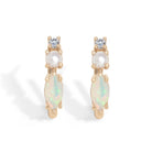 Inspired by our bestselling ring, these 14K gold hoops feature marquise-cut natural Australian opals, freshwater pearls, and natural diamonds – the perfect balance of uniqueness and simplicity for everyday wear. &nbsp;