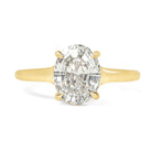 Oval step cut 2ct diamond ring on white background 