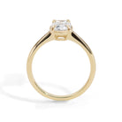 Gold milgrain ring with a 1.5 carat old mine cut diamond on a white background