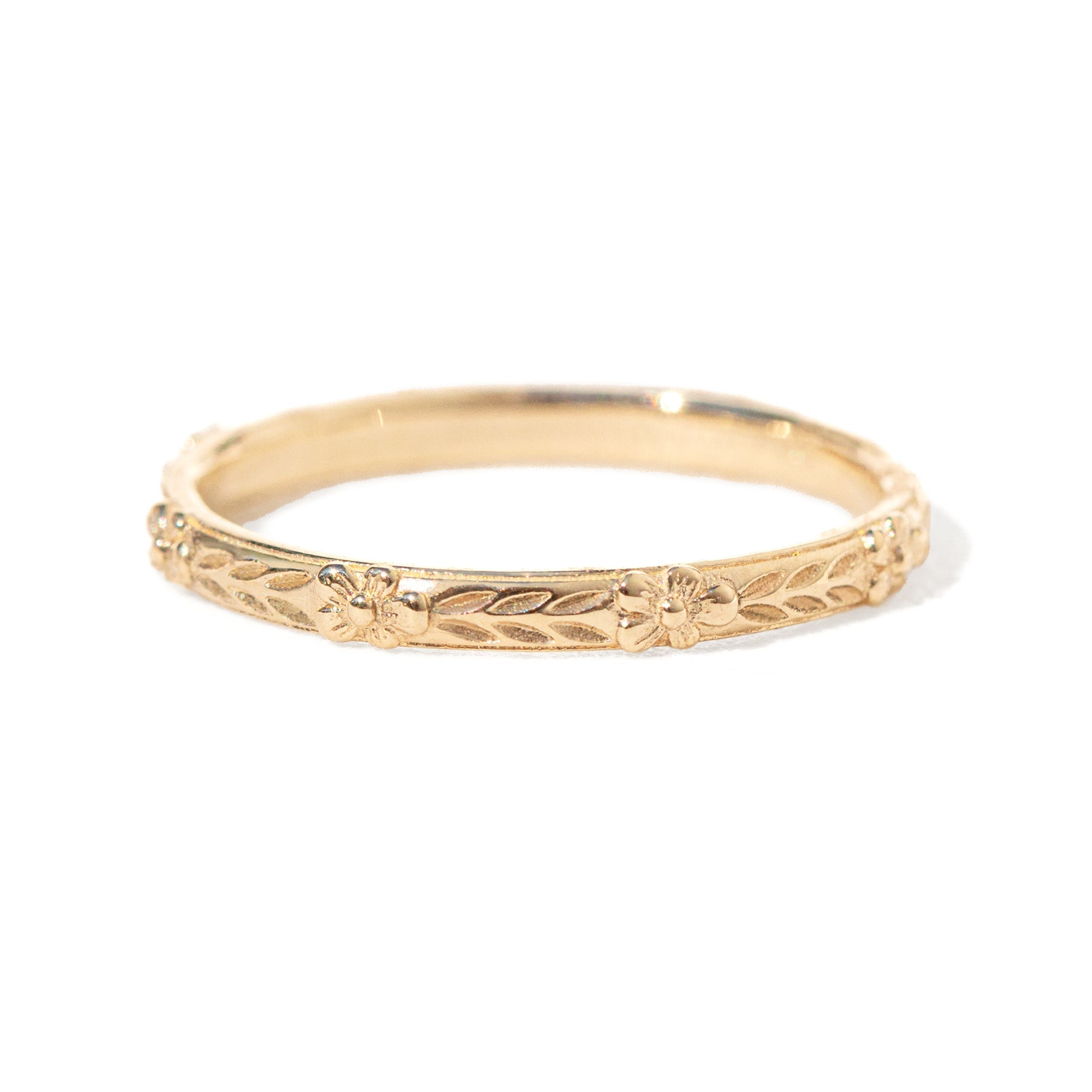 Jamie Park Jewelry - Flower Market Band Add effortless elegance to your everyday style with the Flower Market Band. The intricate vintage inspired pattern exudes sophistication, making it a perfect choice for both casual and formal occasions. Elevate your look with this beautiful and versatile piece, perfect as a standalone band or as a complement to your engagement ring or wedding band. Edit alt text