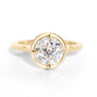 The Riviera Hidden Halo Ring features a 2ct Old European cut diamond or moissanite set in a collet setting, with a delicately highlighted hidden halo beneath. This elegant and romantic design effortlessly blends old-world charm with a modern aesthetic. It’s the perfect choice for engagements, milestone celebrations, birthdays, and anniversaries, making it a timeless piece.