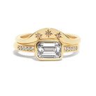 This gently curved, sculpted Starburst Diamond Contour Band is designed to complement your engagement ring with effortless elegance. Its graceful silhouette and subtle sparkle make it a timeless accent to your ring stack.
