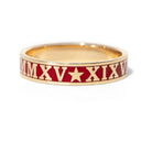Gold ring with red band featuring Roman numerals and a star on a white background