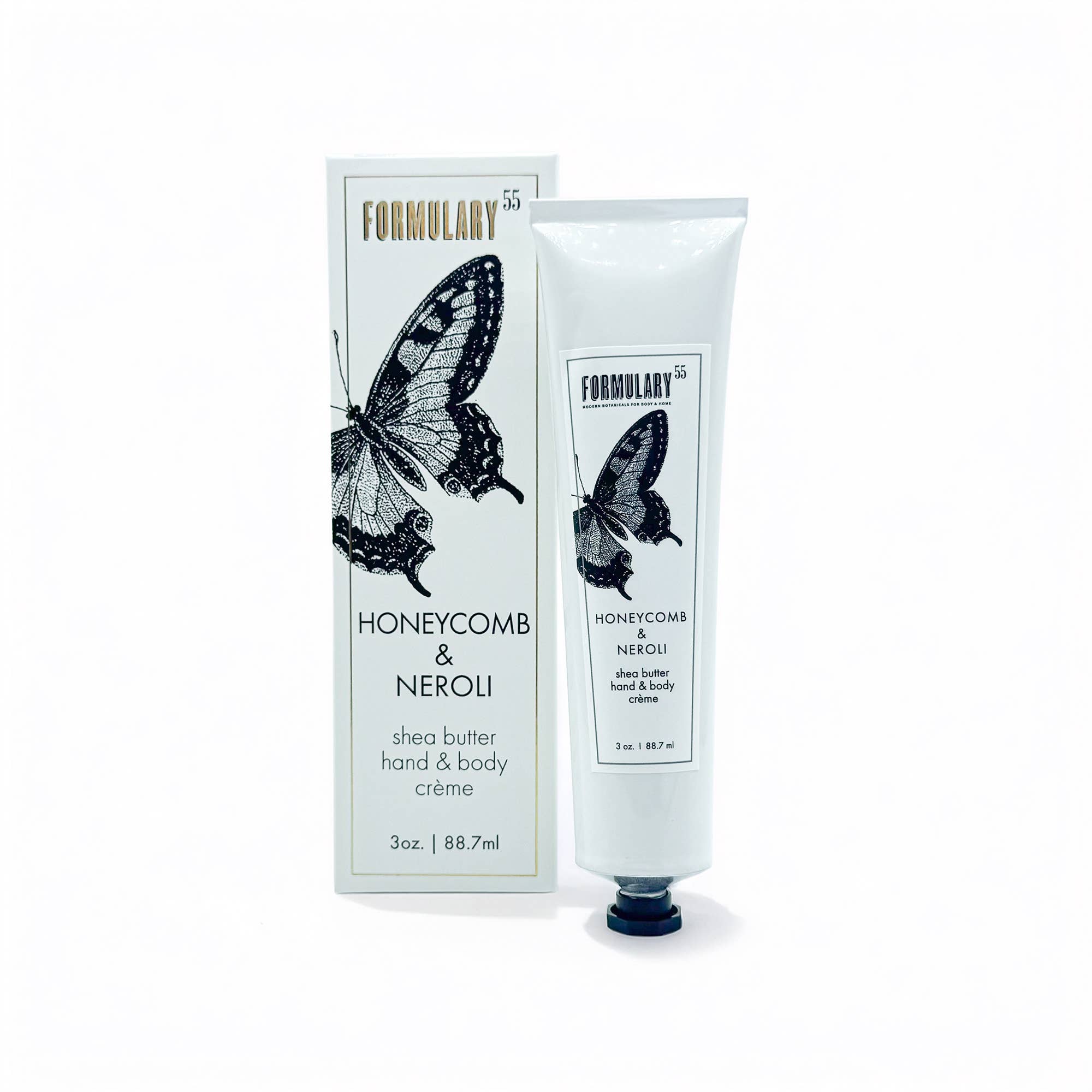 Shea butter hand and body crème with packaging featuring a butterfly design on a white background