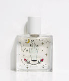 Perfume bottle with artistic design on a white background