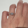 The Zoey Ring features a 1-carat emerald-cut diamond or moissanite in an east-west setting. The smooth bezel setting ensures everyday wear, while delicate accent diamonds add sparkle from every angle