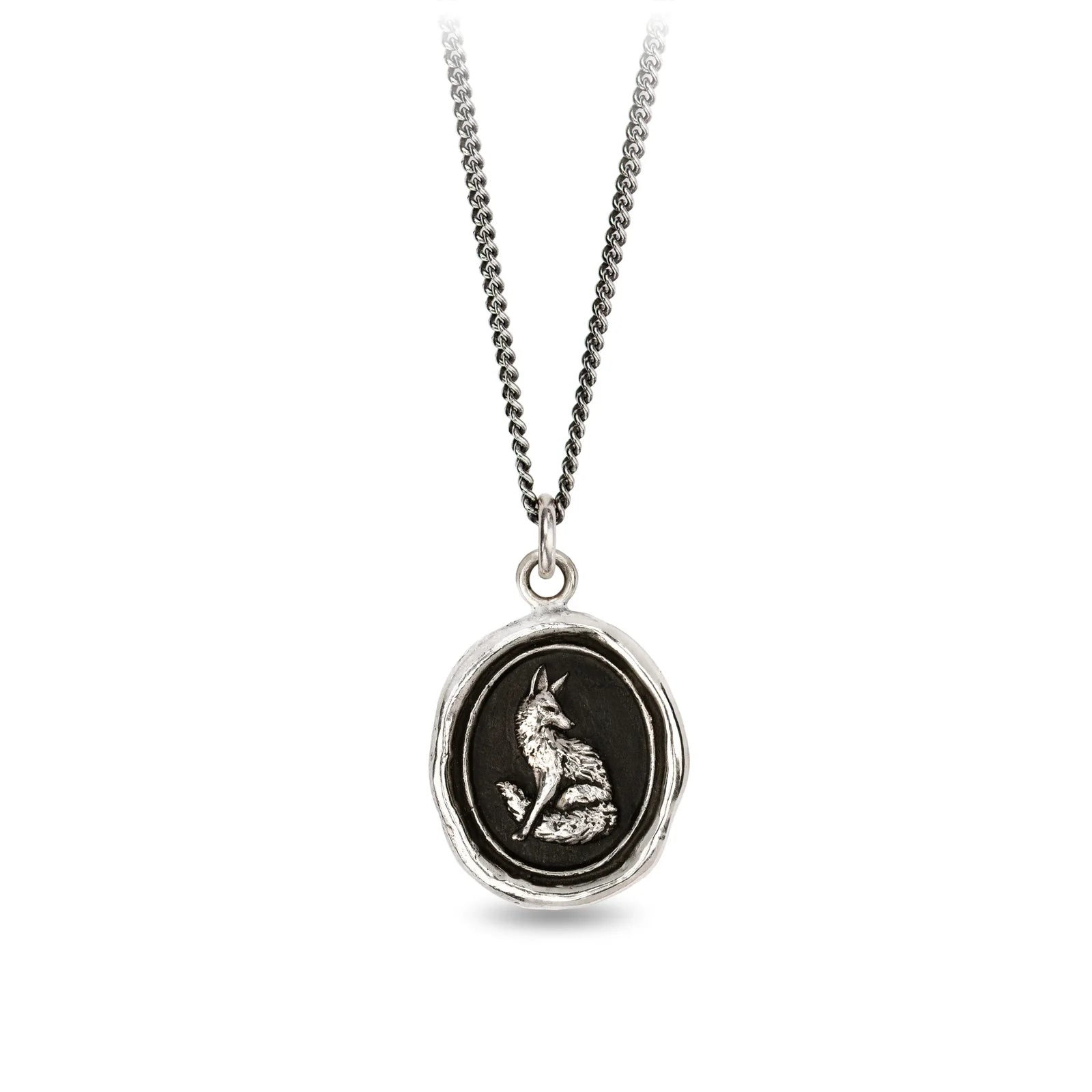Silver necklace with a round pendant featuring a fox design on a white background
