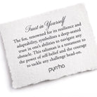 White stone with engraved text and 'pyrrha' branding on a white background